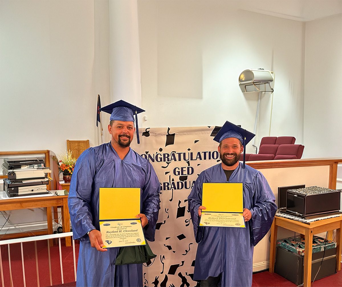 GED graduates Rayford C. and Robert G.